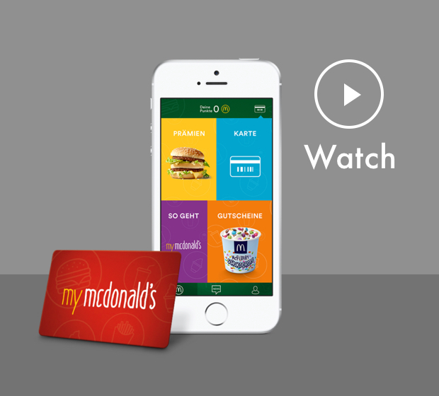 boy scanning his phone in a McDonalds store